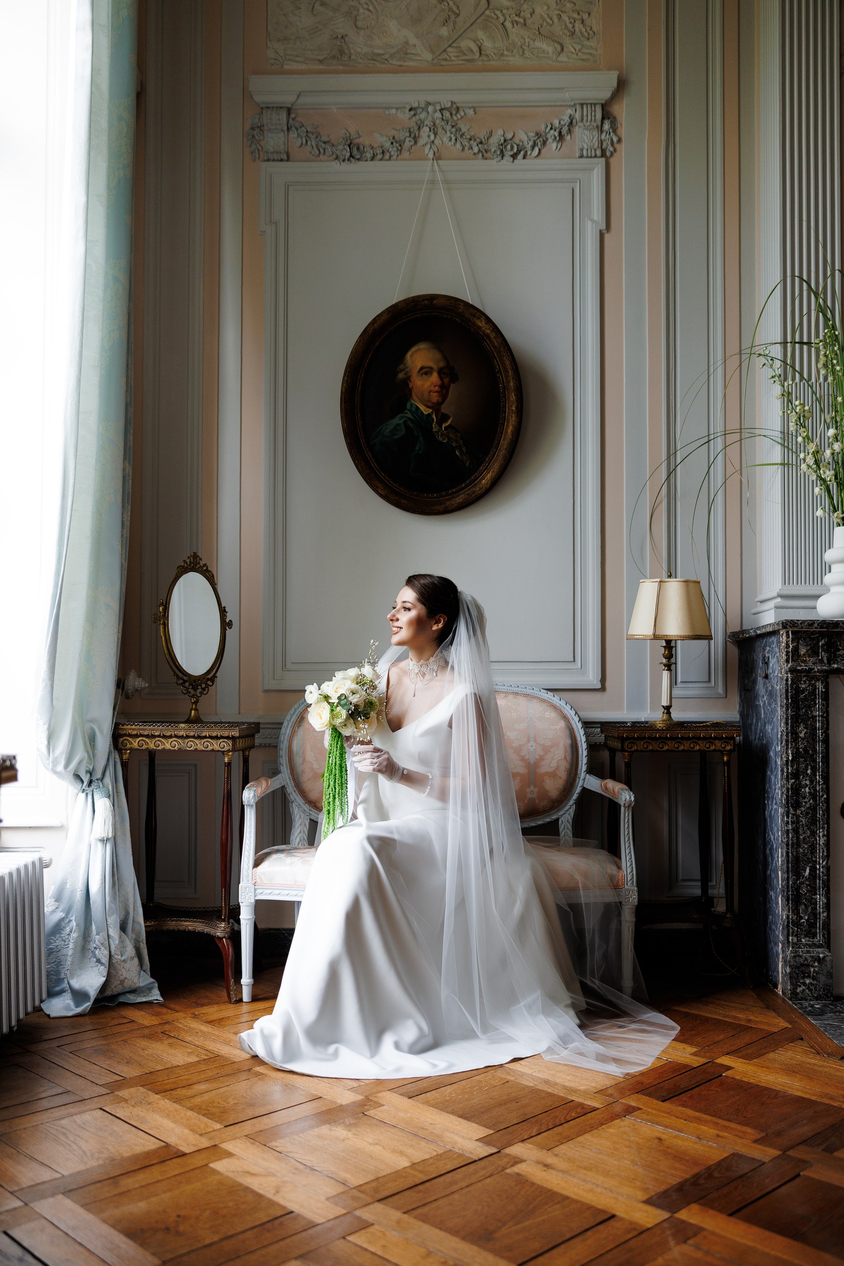 beutiful bride preparing for the wedding in a french chateau